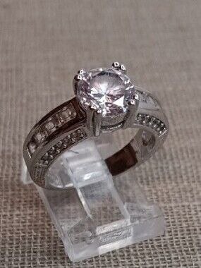 Silver Tone Round Faceted Solitaire Ring with Pavé Accents Size 7